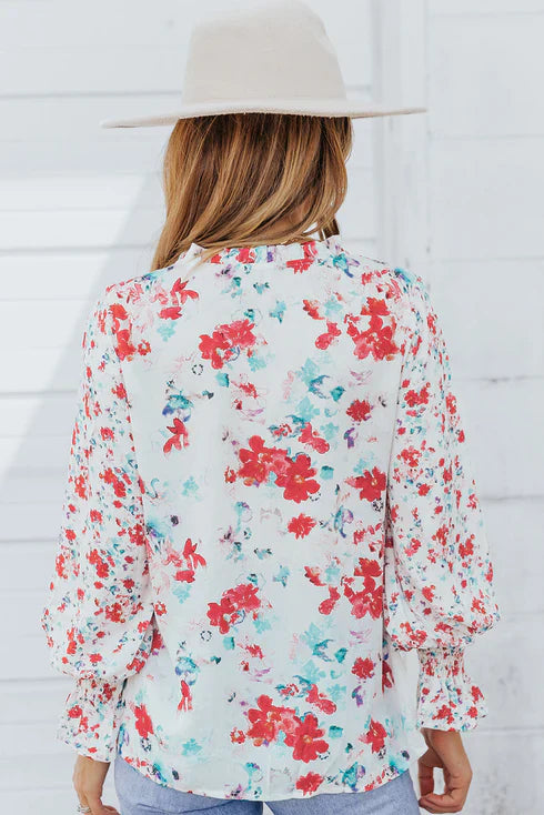 Elegante gebloemde gesmokte blouse met charmante details