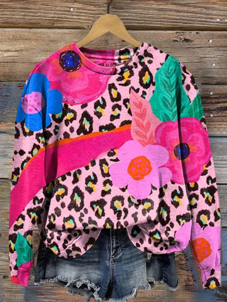 Sweater met lange mouwen en ronde hals met artistieke roze luipaardprint en bloemen